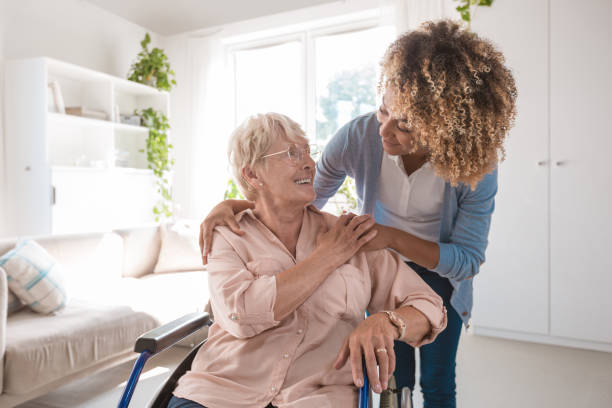 Nurse and client smiling during a wellness check